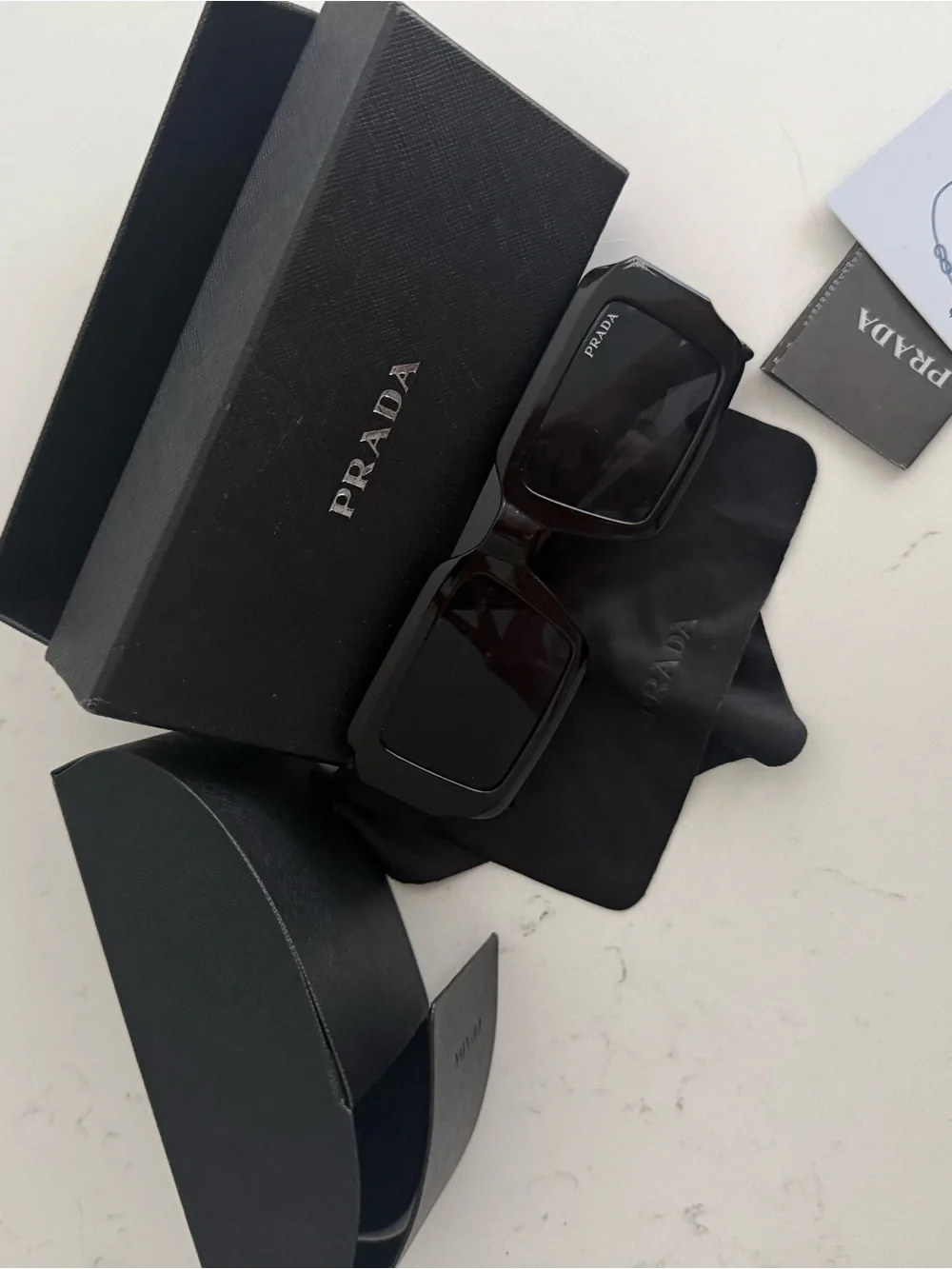 Prada Glossy Black Rectangular Sunglasses for women